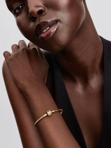 14k gold-plated bangle with clear cubic zirconia