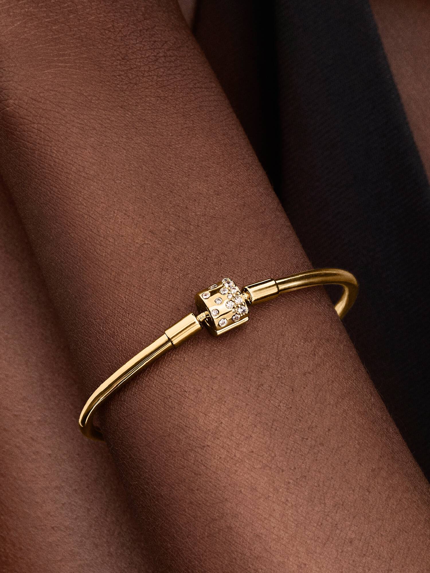 14k gold-plated bangle with clear cubic zirconia